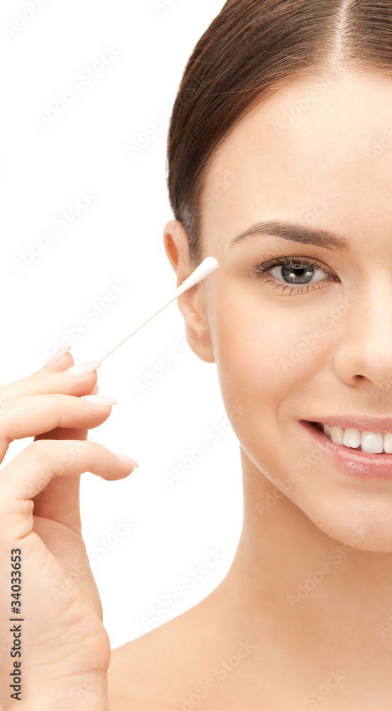 beautiful woman with cotton bud