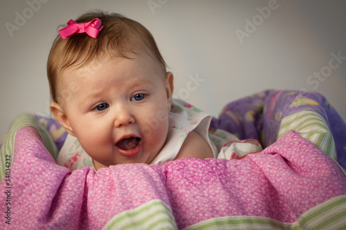 Baby Girl in Pink Basket