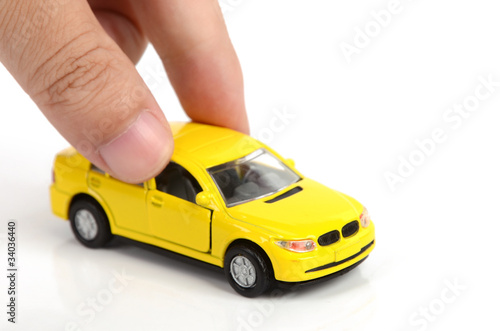 Toy car and hand