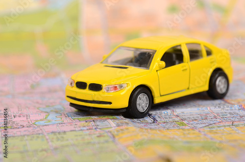 Yellow car and map