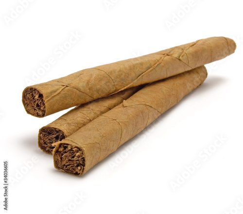 Obraz na płótnie Three cigar stack macro closeup, isolated cigars and shadow
