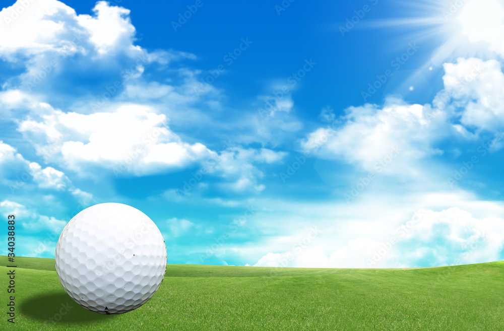 Golf ball on tee in a beautiful golf club Golf ball on tee in a beautiful golf club