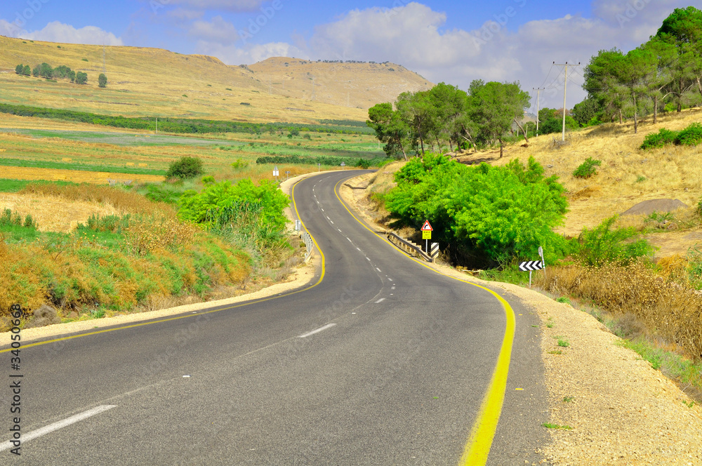 Curved highway in rural  area of Galilee district in Nothern Israel.