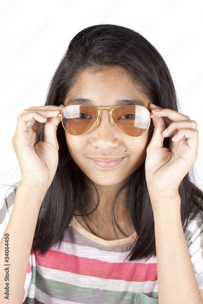 teenager, Asian girl wearing light brown sunglasses.