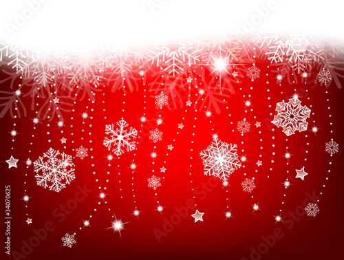 Winter background with snowflakes and fir branches