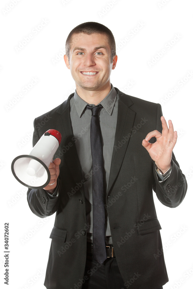 Portrait of a young business man having good news Portrait of a young business man having good news