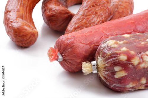 Schilderij op canvas smoked sausage over white
