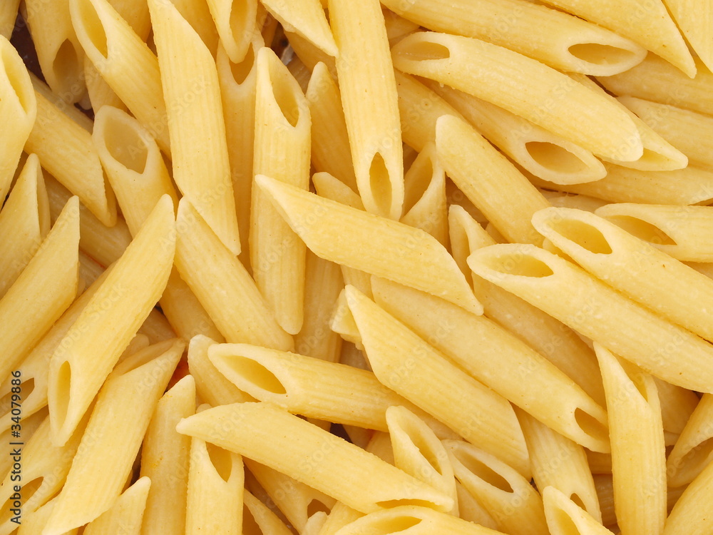 Closeup Background of Cooked Italian Penne Pasta Closeup Background of Cooked Italian Penne Pasta