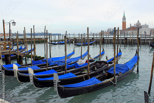 Italy, Venice gondola parking at sunset © claudiozacc