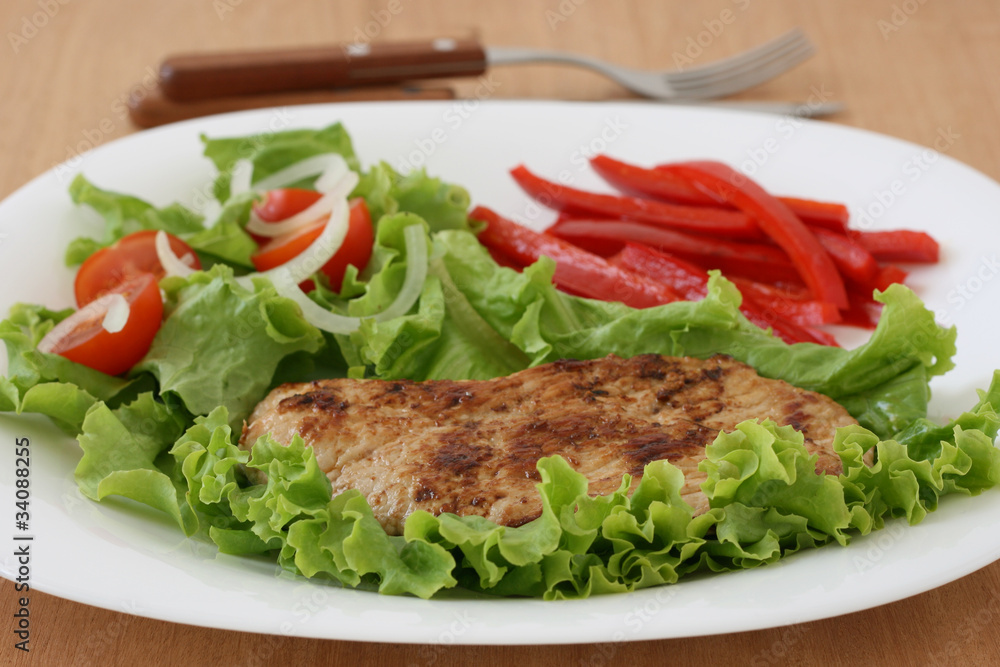 Fried pork with salad