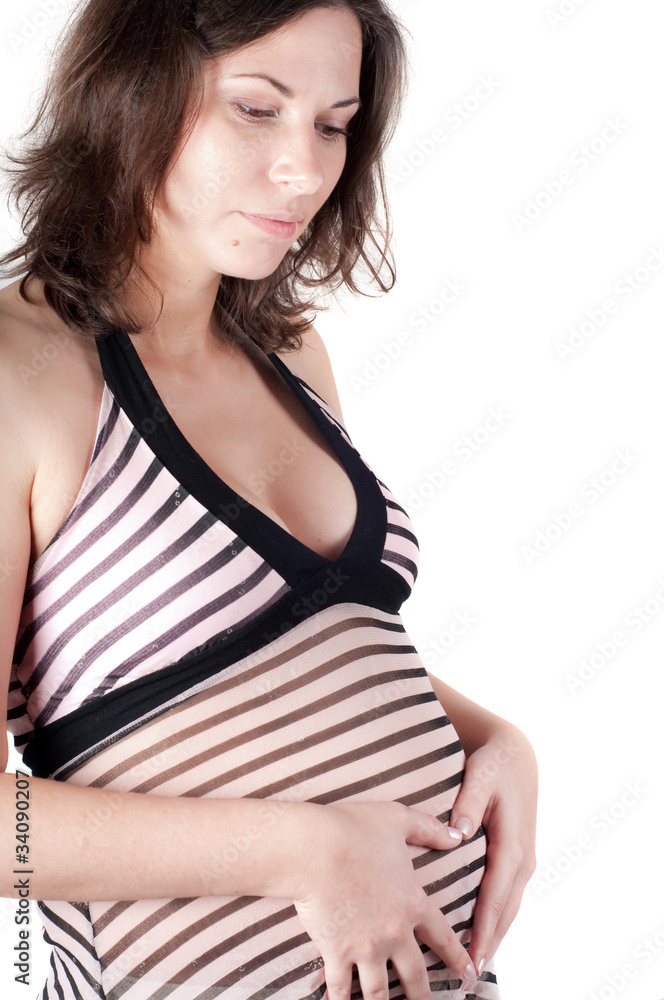 Pregnant woman hands in form of heart sign Pregnant woman hands in form of heart sign