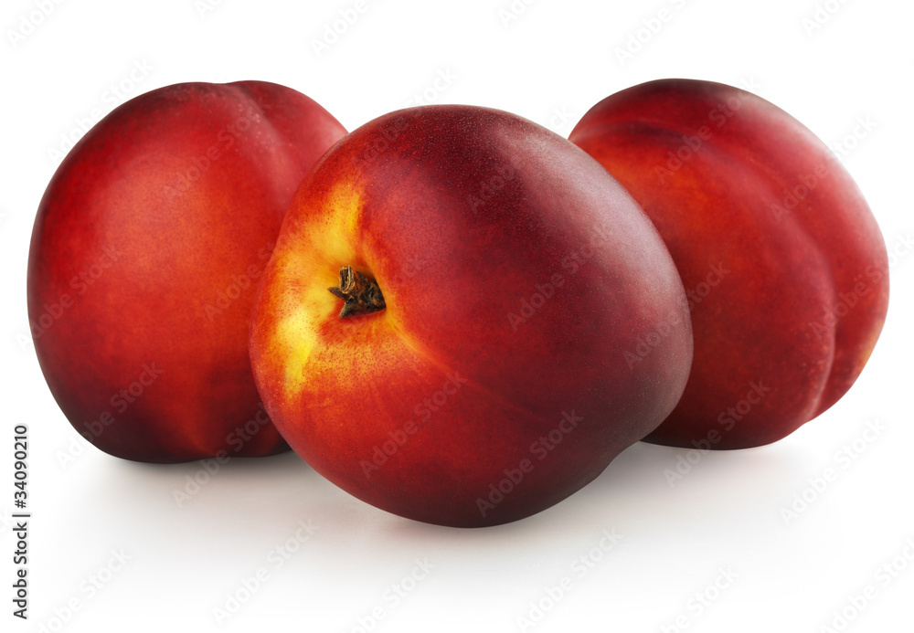 Three nectarines isolated on white Three nectarines isolated on white