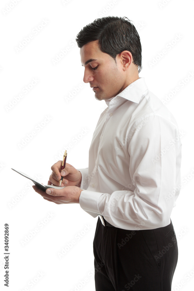Businessman or waiter writing in notepad Businessman or waiter writing in notepad
