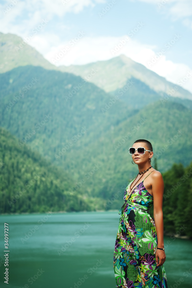 girl in mountains on the lake