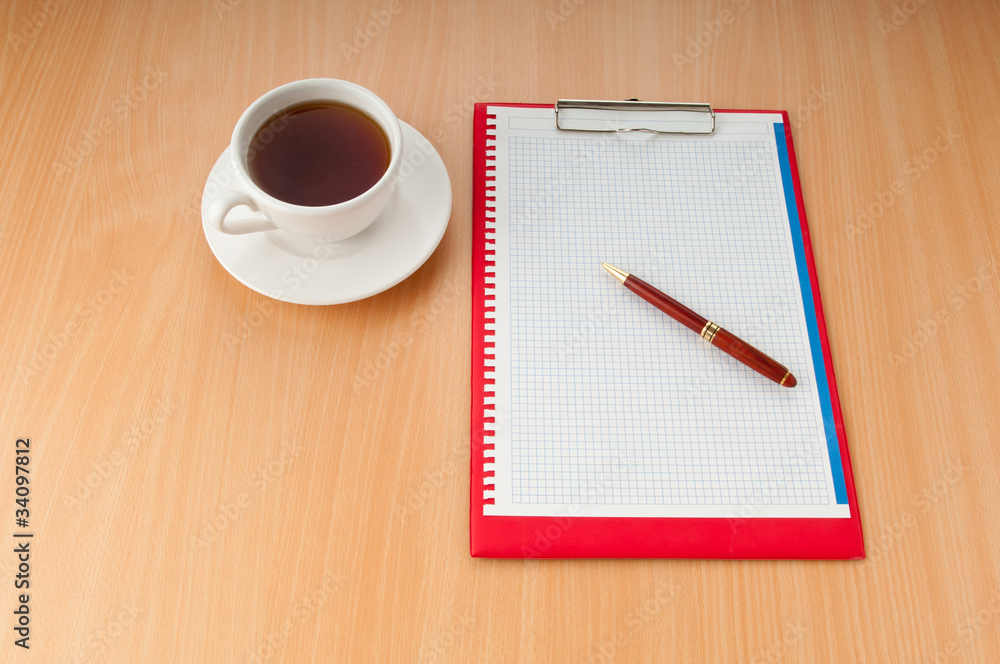 Binder with blank page and tea Binder with blank page and tea