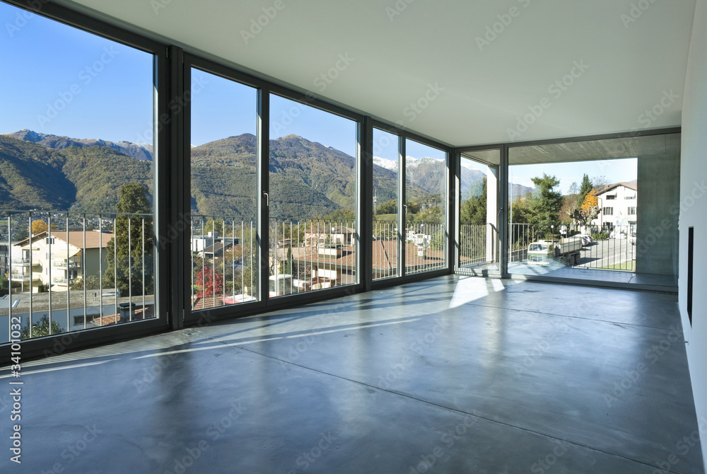 grande locale vuoto moderno, con una parete in vetro grande locale vuoto moderno, con una parete in vetro