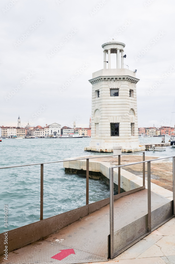 View of the Lighthouse and waterfront, Venice, Italy.