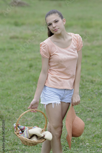 girl posing with basket