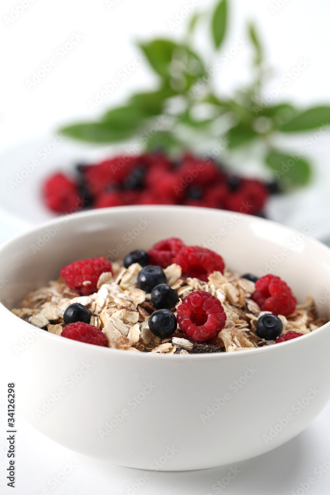 Granola with raspberries and blueberries Granola with raspberries and blueberries