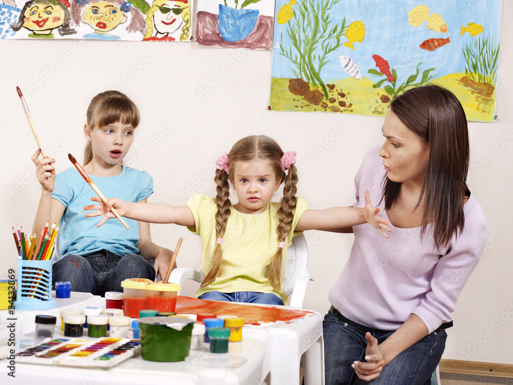 Fototapeta premium Child painting in preschool.