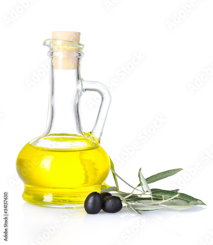 olive oil and olives isolated on white