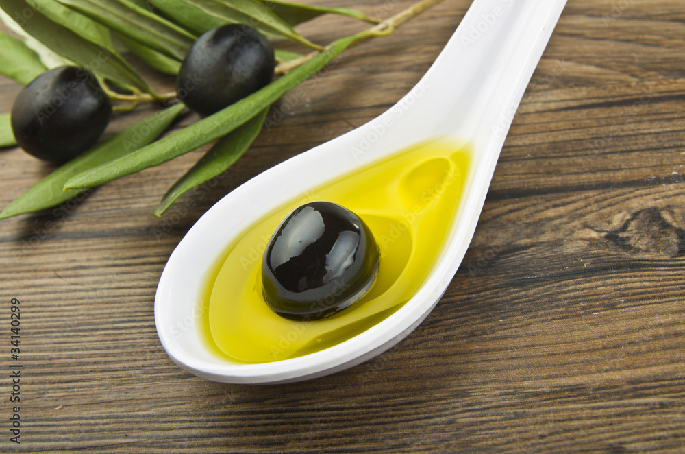 Spoon with black olive