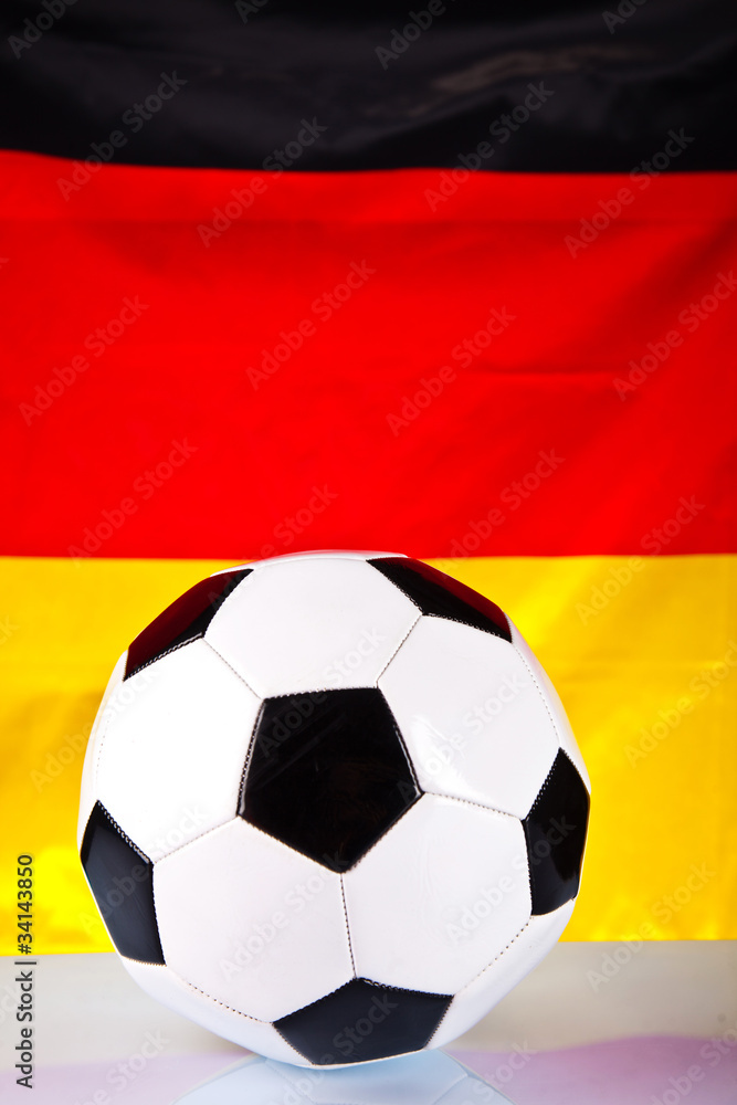 Fototapeta premium soccer ball and german flag