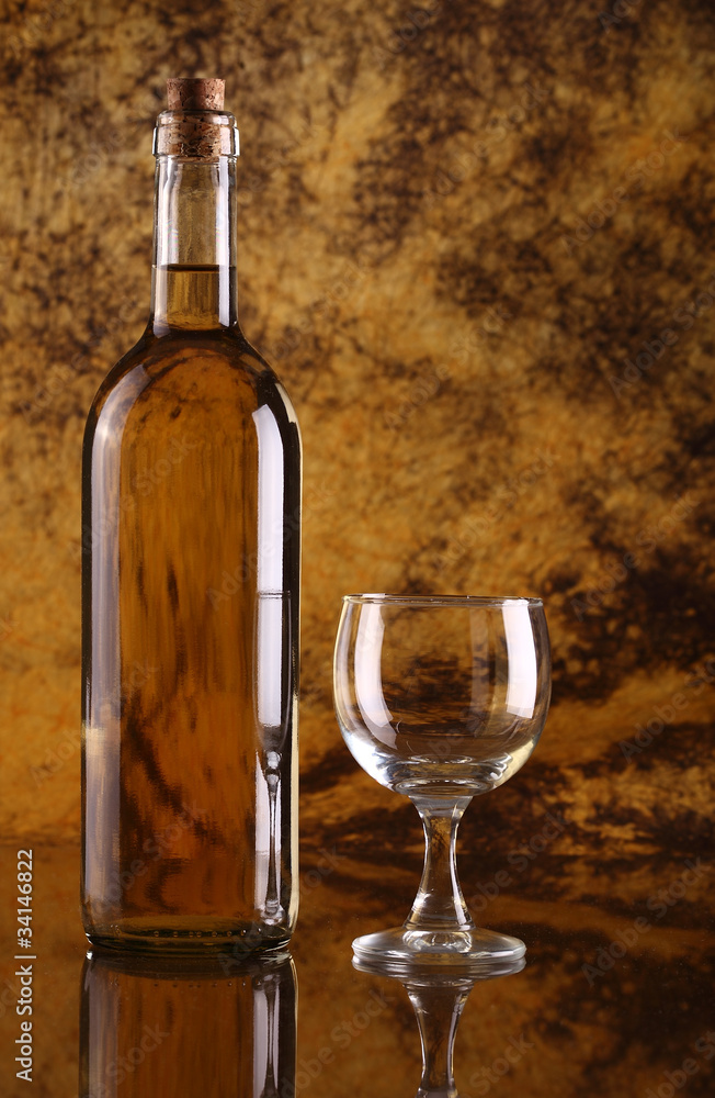 White wine with glass against colorful background