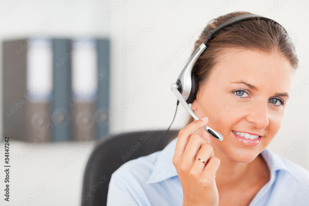An operator supporting a customer An operator supporting a customer