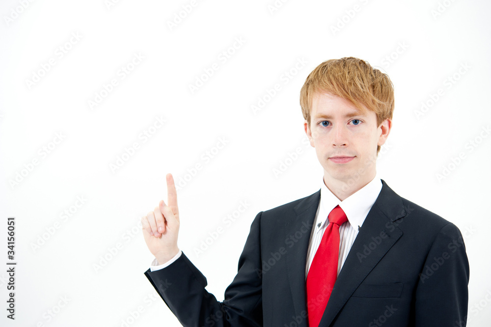a portrait of young businessman pointing a portrait of young businessman pointing