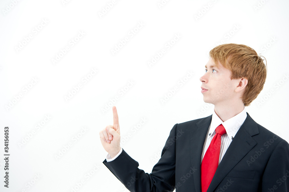 a portrait of young businessman pointing a portrait of young businessman pointing