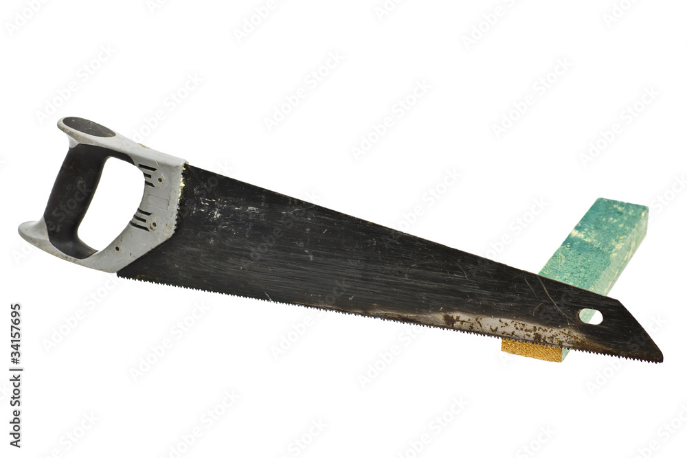used handsaw with wood on white background used handsaw with wood on white background