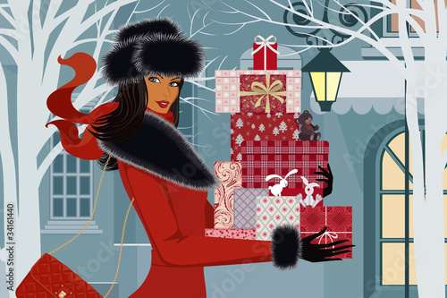 Beautiful woman with christmas gifts