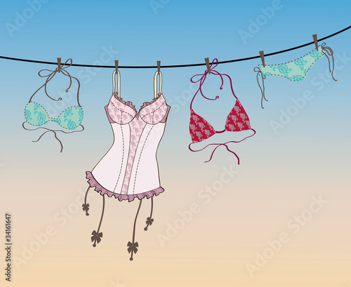 Pantie, bra and lingerie hanging on rope