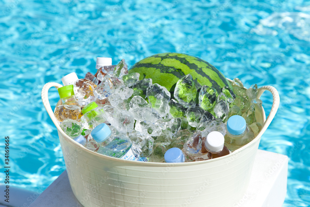 プールサイドで冷やすスイカと飲料水 Stock Photo Adobe Stock