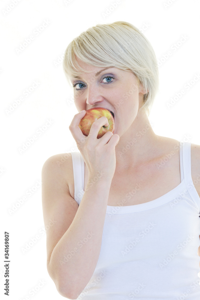 happy young woman eat green apple isolated on white happy young woman eat green apple isolated on white