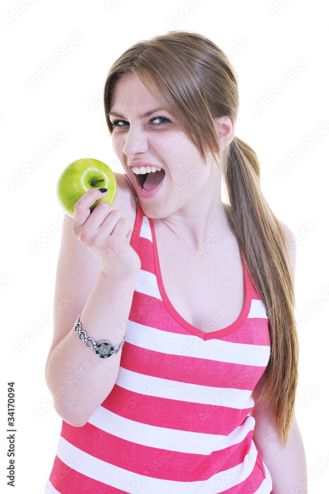 happy young woman eat green apple isolated on white happy young woman eat green apple isolated on white