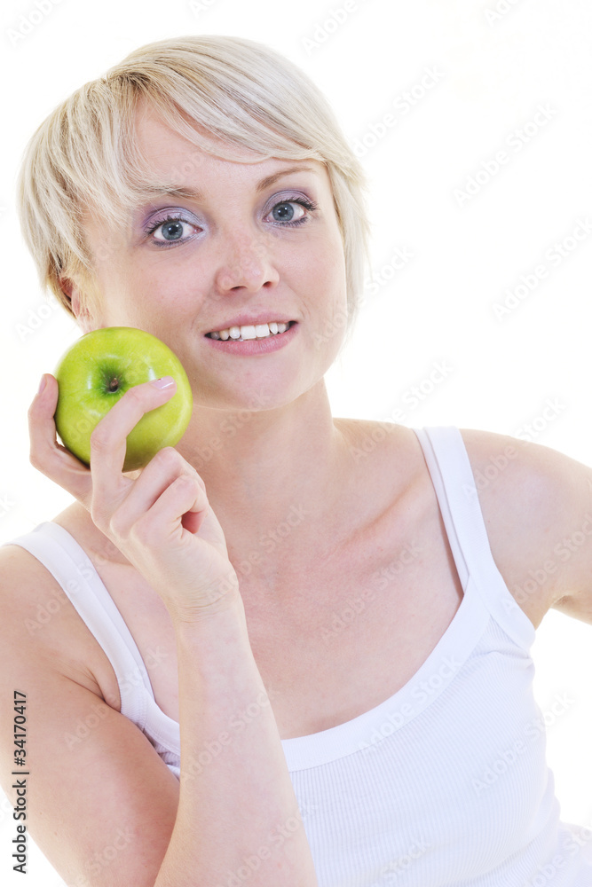 happy young woman eat green apple isolated on white happy young woman eat green apple isolated on white