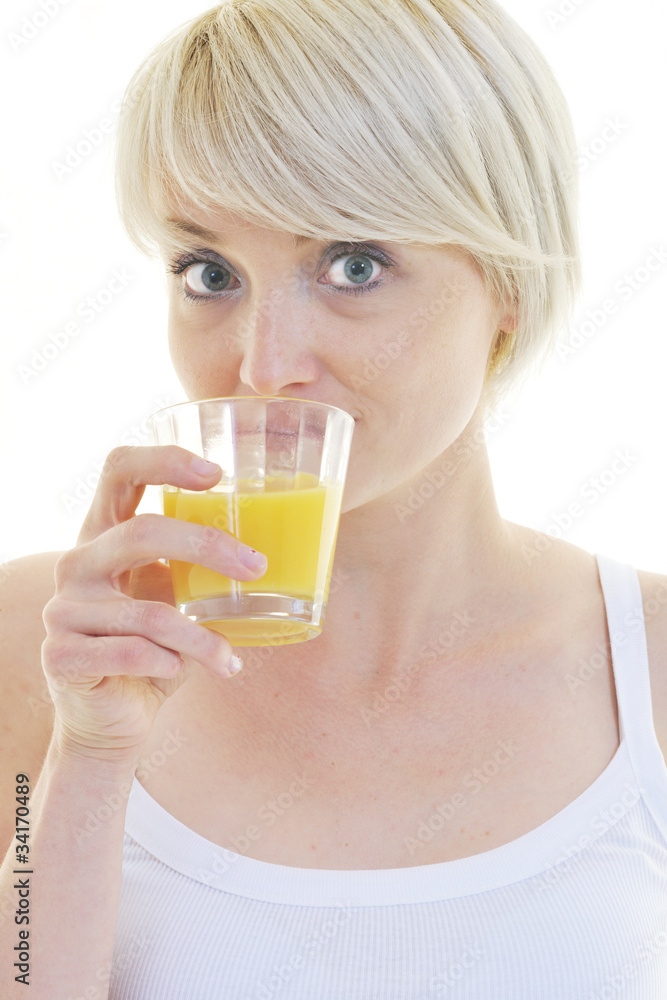 Young woman drinking orange juice isolated over white background Young woman drinking orange juice isolated over white background
