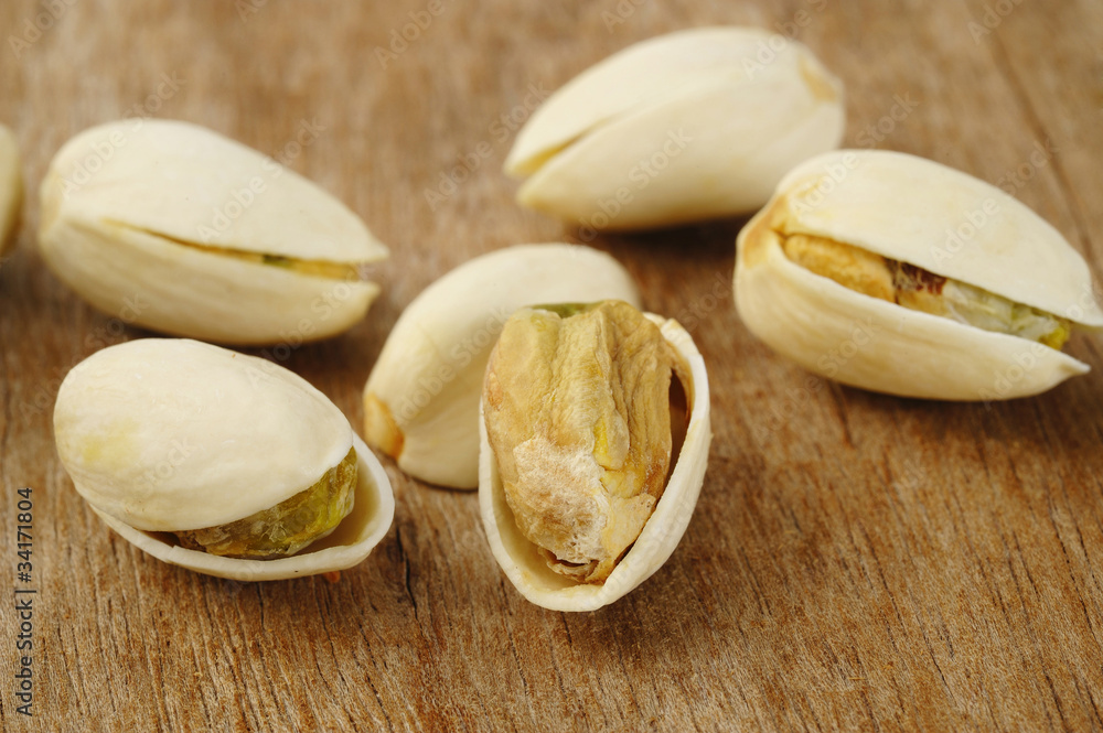 pistachio on wooden pistachio on wooden