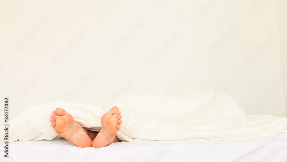 Wobbling toes under a sheet Wobbling toes under a sheet