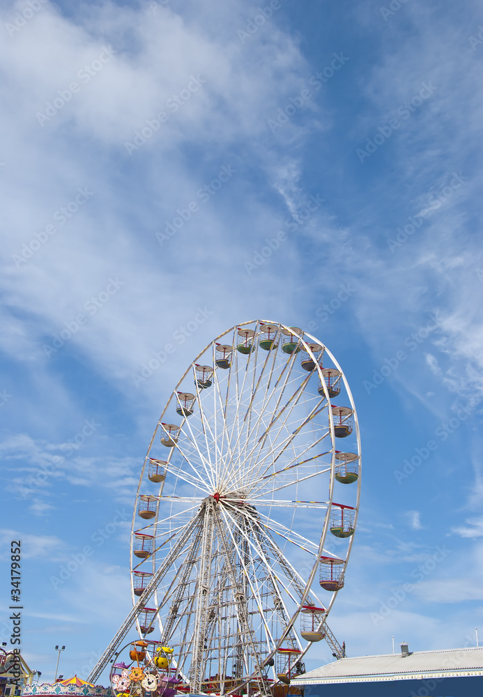 Fairground Wheel on a pier at the seaside