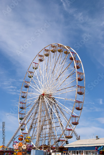 Fairground Wheel against a blue summer sky