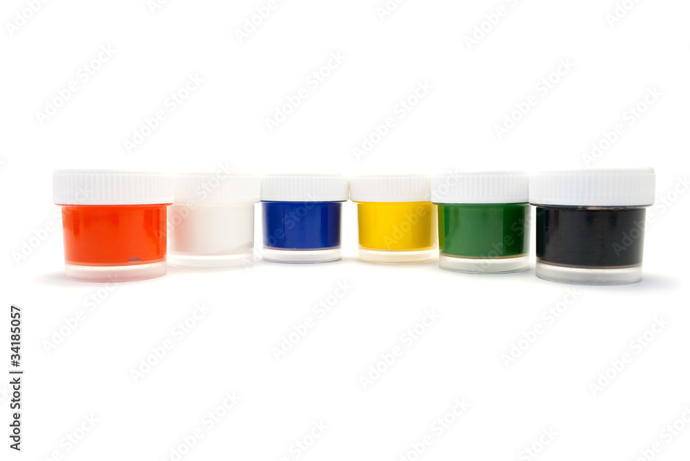 A set of colored paints in transparent plastic containers A set of colored paints in transparent plastic containers
