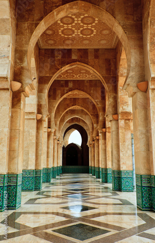 Intricate marble and mosaic archway outside mosque