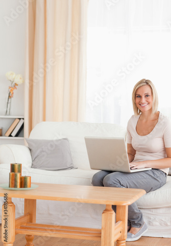 Portrait of a beautiful woman with a laptop