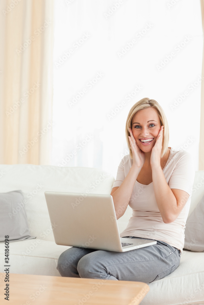 Portrait of a happy woman with a laptop Portrait of a happy woman with a laptop