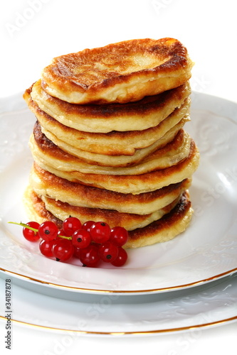 Pancakes with red currants.