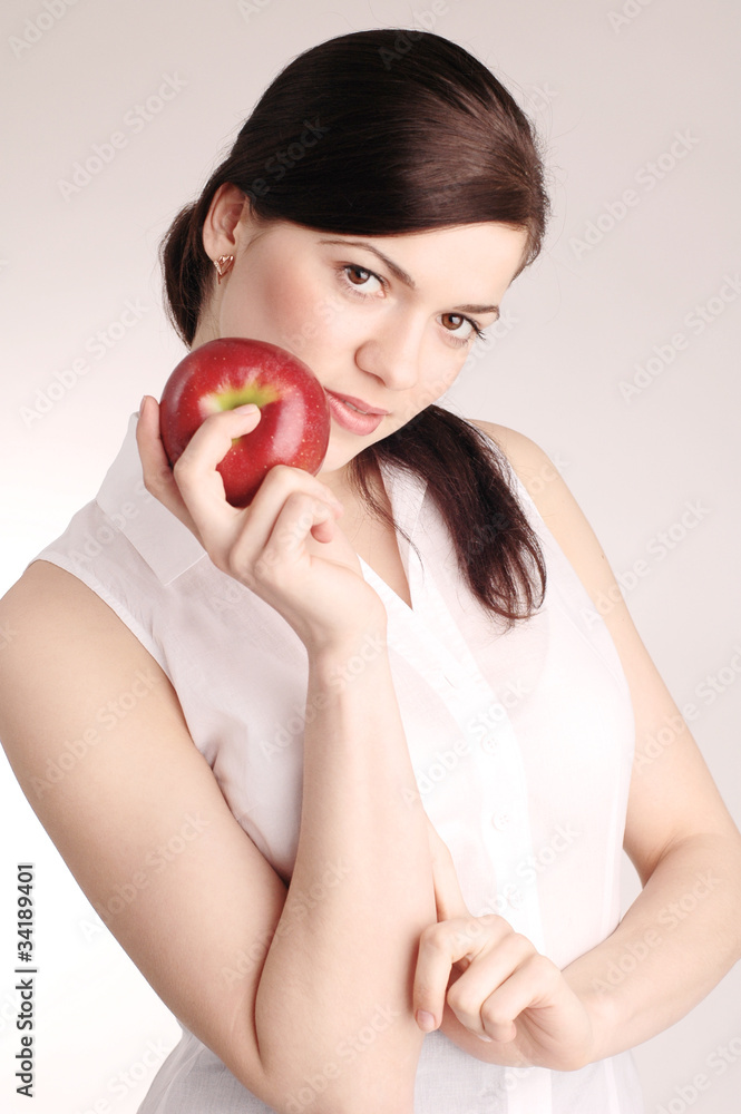 Young beautiful woman with red apple Young beautiful woman with red apple