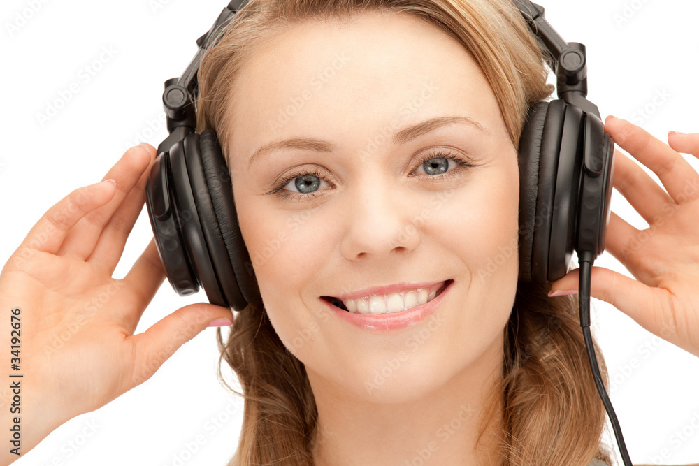 happy teenage girl in big headphones happy teenage girl in big headphones